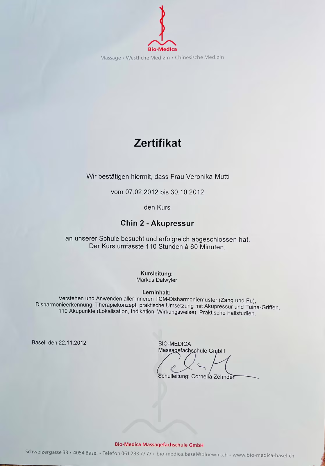 Certificate from Bio-Medica massage school for Ms Veronika Mutti, confirming successful completion of the course Chin 2 - Acupressure with 110 hours from February to October 2012 in Basel.