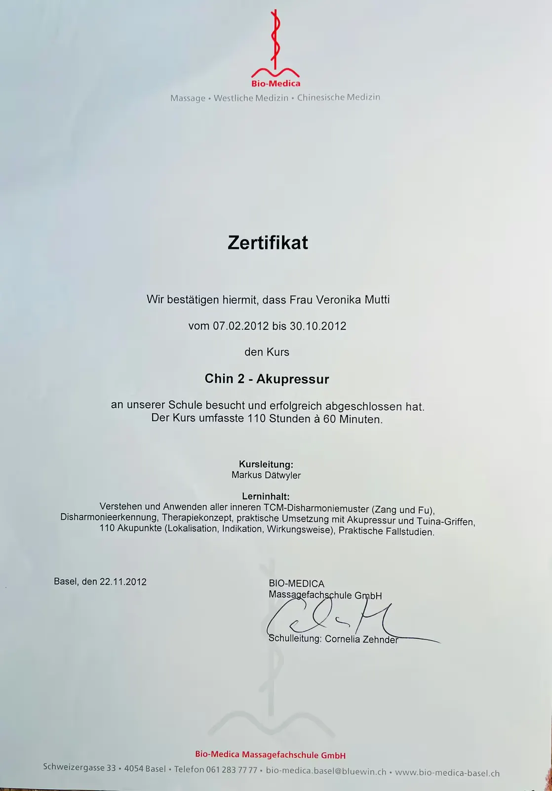 Certificate from Bio-Medica massage school for Ms Veronika Mutti, confirming successful completion of the course Chin 2 - Acupressure with 110 hours from February to October 2012 in Basel.